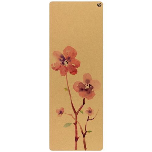Yoga mat with floral design on a beige background